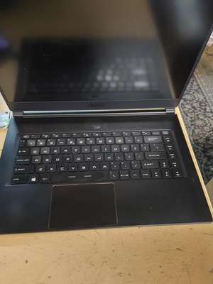 MSI Laptop MS-16Q2 , NO BOOTS TO BIOS , FOR PARTS ONLY