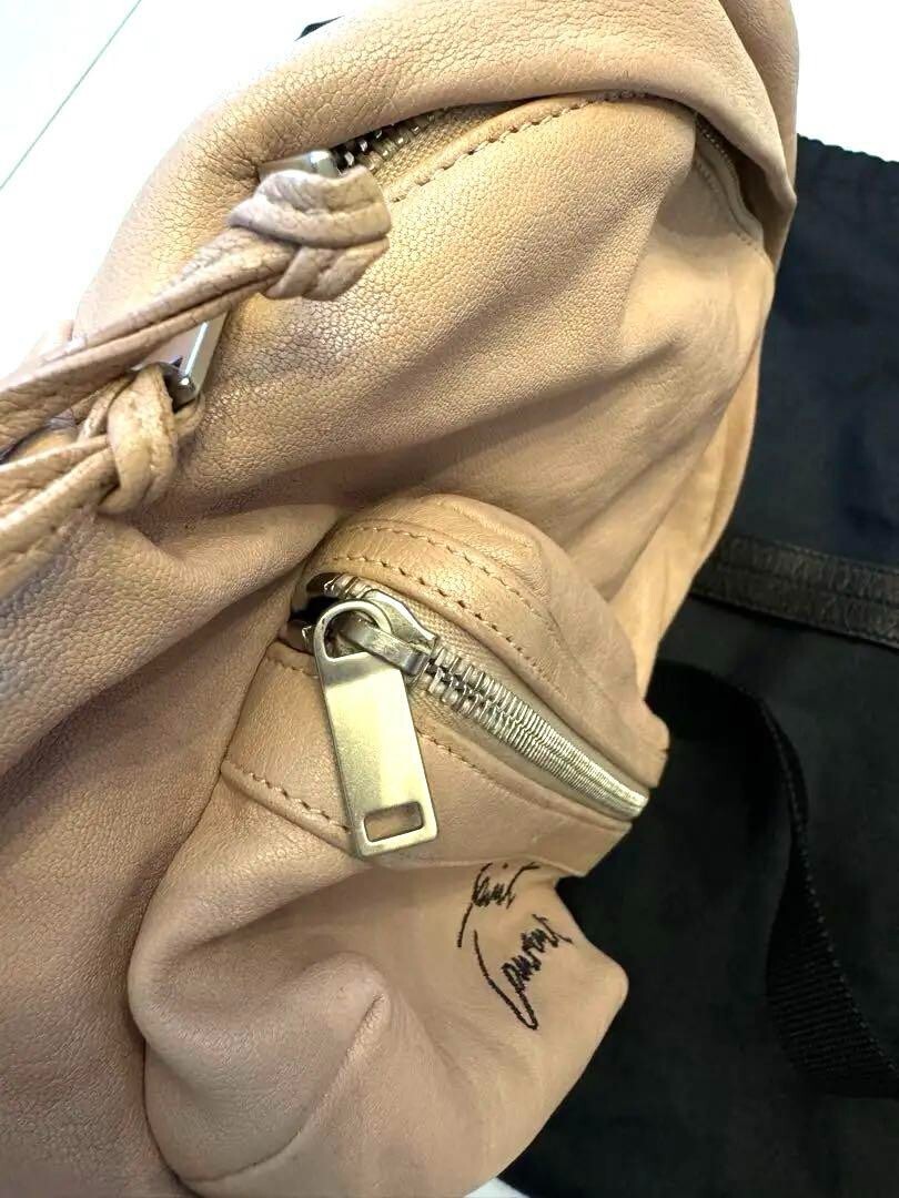 Mini zaino Saint Laurent rosa con borsa portaoggetti