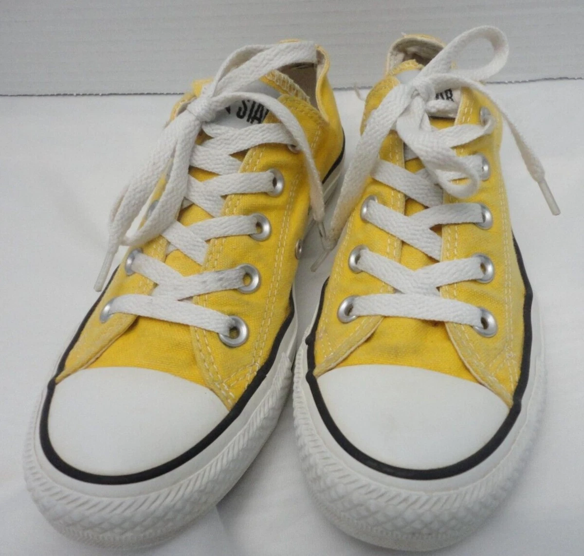 Golden store yellow converse