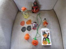 Lot of vintage Halloween items, bottle, clip-on, sacks, bubble blower necklace