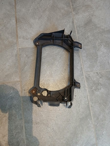 VW Bus T4 Scheinwerferrahmen orig. VW Hella 136351-00 Scheinwerferträger LINKS