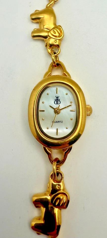 Reloj Brooks & Bentley vintage para mujer de los años 80 tono dorado con dije de elefante en caja Foto 4 de 4