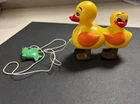 Vintage yellow rubber ducks ramp walker Marx Toys collectible rare fish