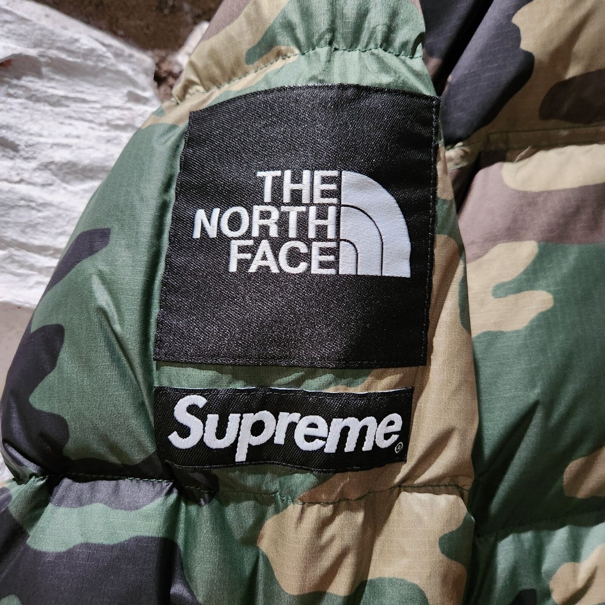 Supreme x The North Face Split Nuptse Jacket Woodland Camo Supreme x The North Face Split Nuptse Jacket Woodland Camo