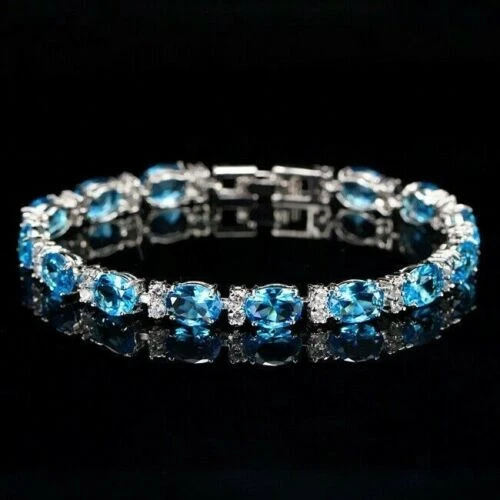 4Ct Oval Simulated Topaz 14K White Gold Plated lovely Tennis Bracelet Women's - Image 2 of 3