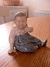A LOVELY ROYAL COPENHAGEN 1517 "CHILD SITTING" FIGURE.