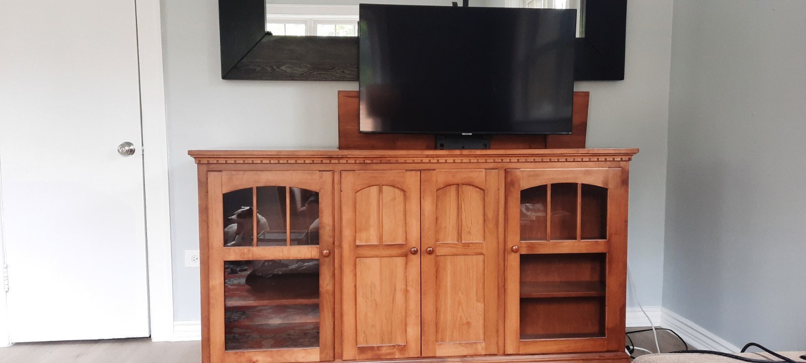 Amish crafted wood entertainment center with recessed TV mou