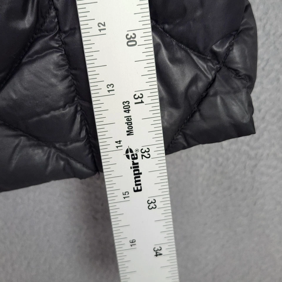 Chaqueta acolchada larga con capucha negra grande Steve Madden Puffer para mujer Foto 4 de 4