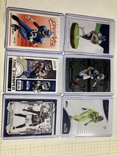Seattle Seahawks- 2 Jaxon Smith-Njigba, 2 tariq woolen rcs,walker rc, trufant rc