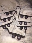 A lot of seven double brass bells on brackets — photo 1