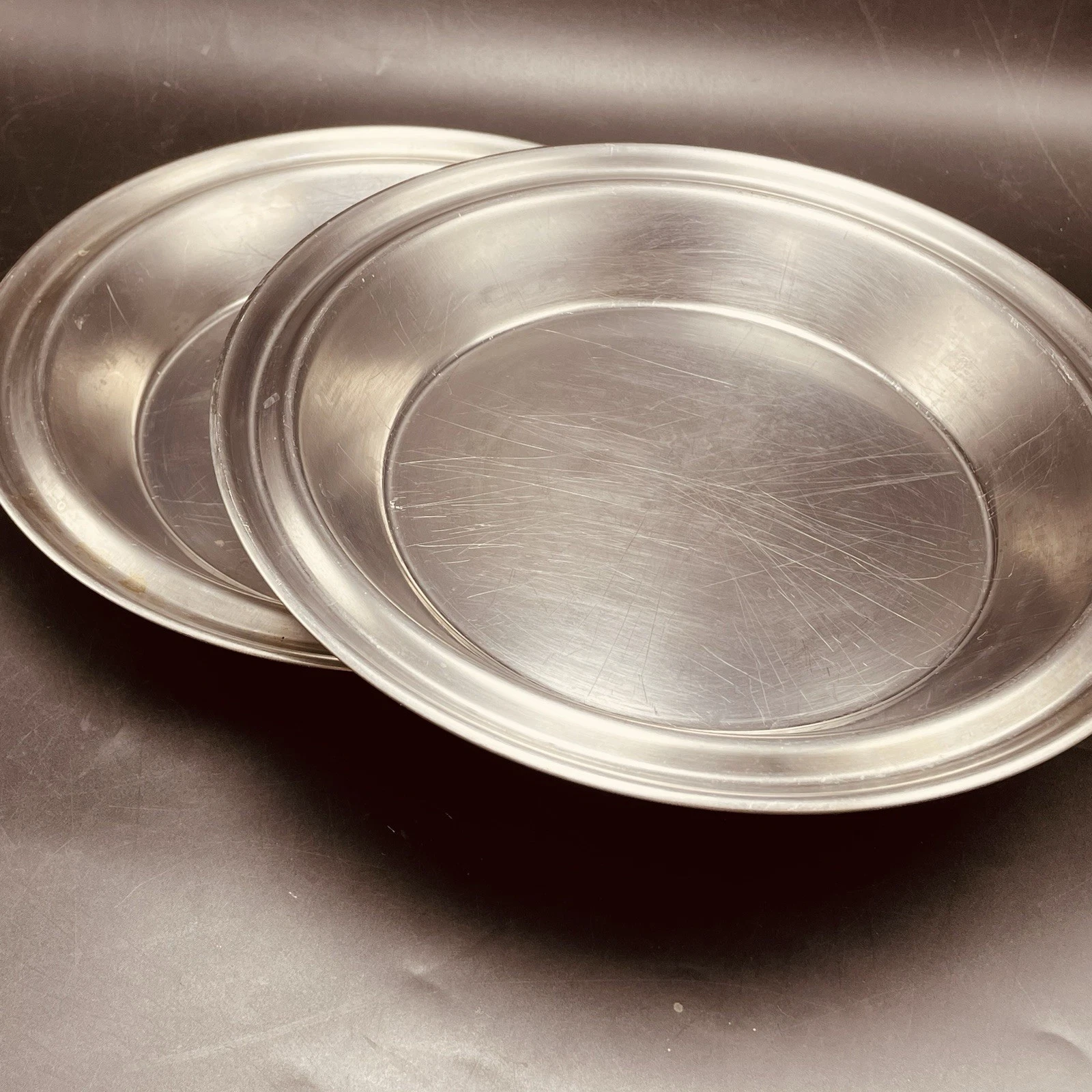 2 Stainless Steel Pie Pans Plates 10” No Drip Edges Juice Catcher Rims Unbranded
Opens in a new wind