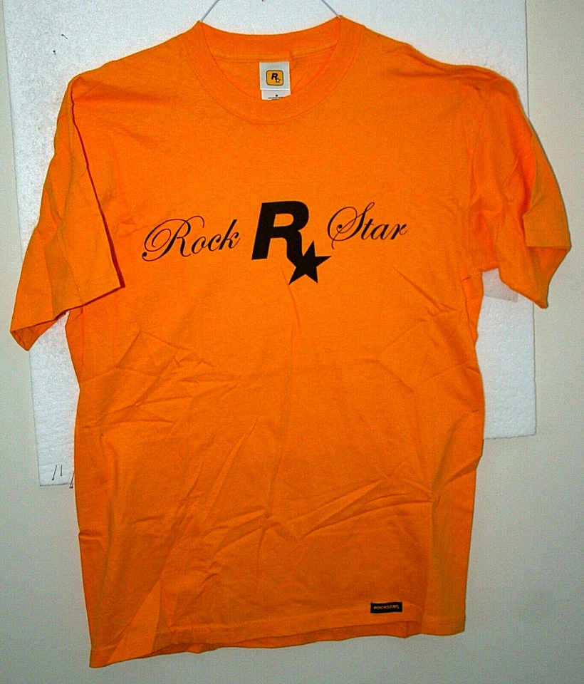 Camiseta Amarilla Brillante Rock Star Videojuego Logo Promocional Nueva de Lote Antiguo Sin Usar Talla Mediana Foto 2 de 4