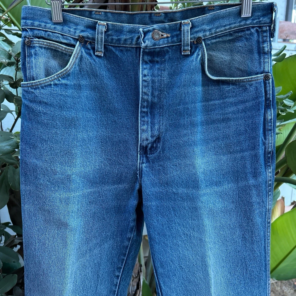Jeans plisados vintage años 80 Wrangler EE. UU. 33x32 azul desteñido desgastado Foto 2 de 4
