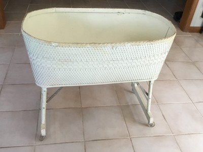 white wicker bassinet