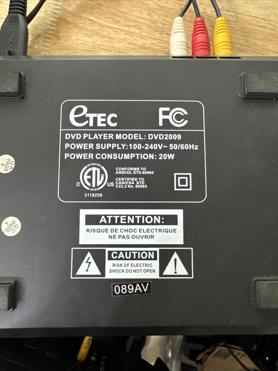 Etec Dvd2009 Dvd Player With Power Cord And RCA Cables & 1 CD