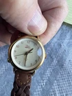 Vintage Women's TIMEX Gold Tone Indiglo Watch with Classic Braided Leather Band