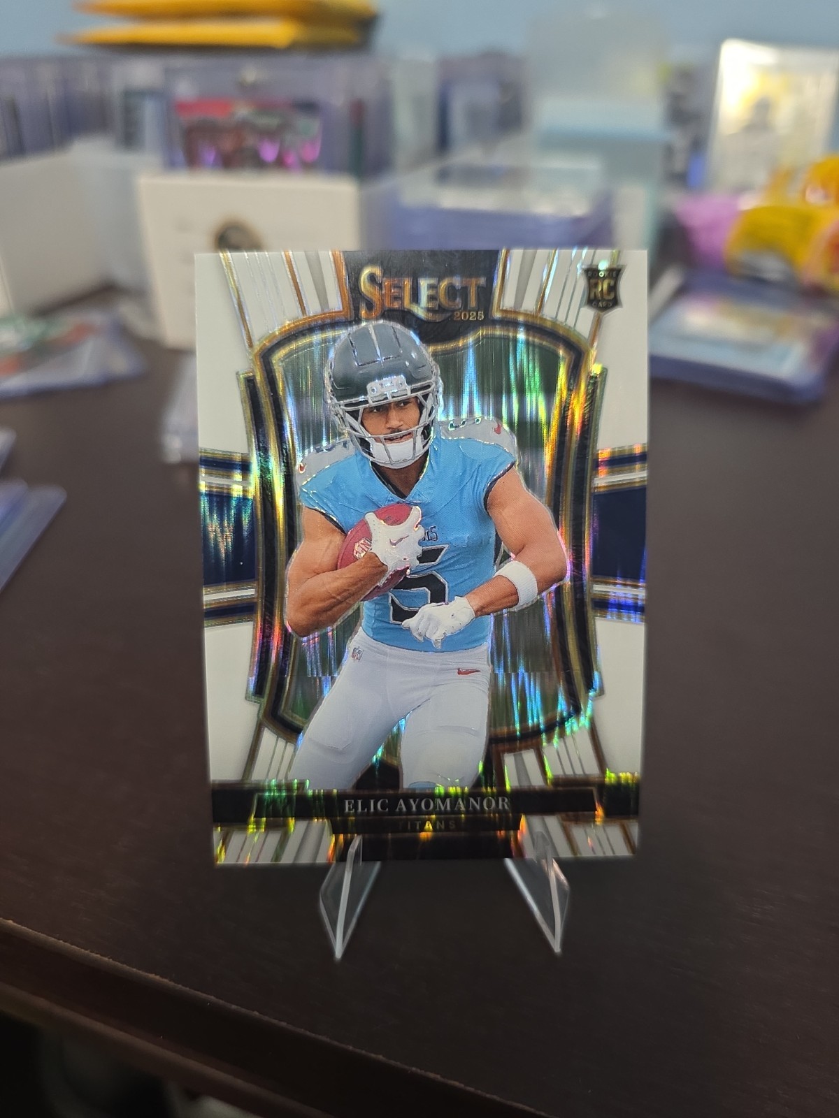 Elic Ayomanor White Prizm Shock /799 2025 Panini Select Premier Level #127 (RC)
