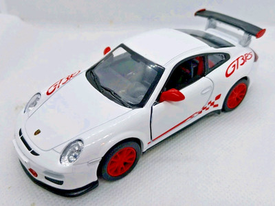 Kinsmart - Maßstab 1:36 Modell 2010 Porsche 911 GST RS weiß (BBKT5352DW)