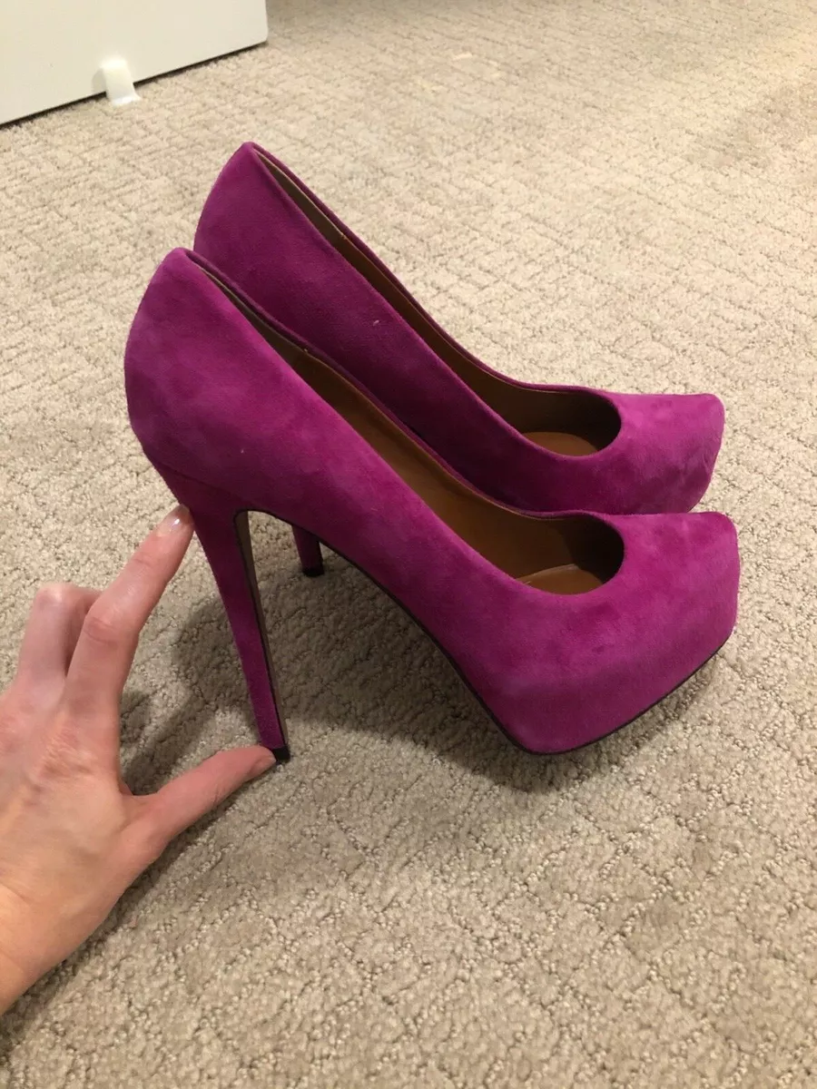 Magenta faux suede, high heeled, open toe, slingback sandal with cork faced  platform and heel on a white background. Women's fashion Stock Photo - Alamy