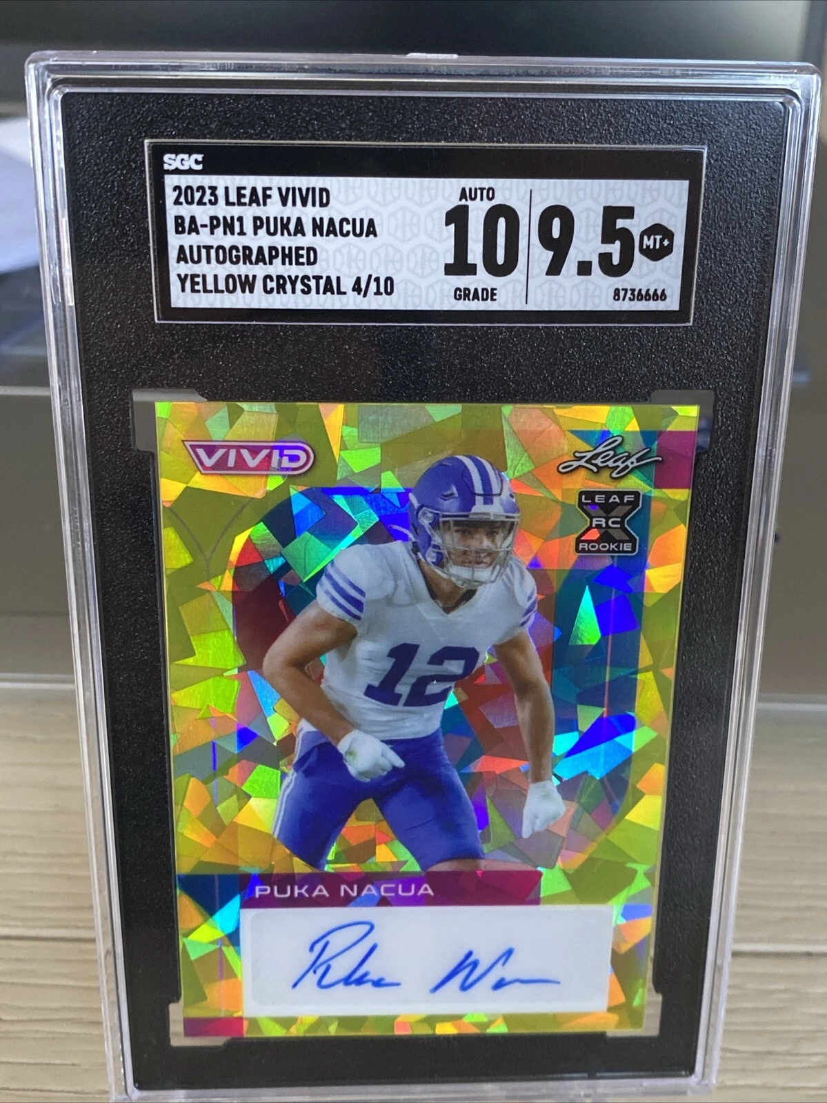 Puka Nacua Leaf Vivid Autographs #BAPN1 Orange Crystal