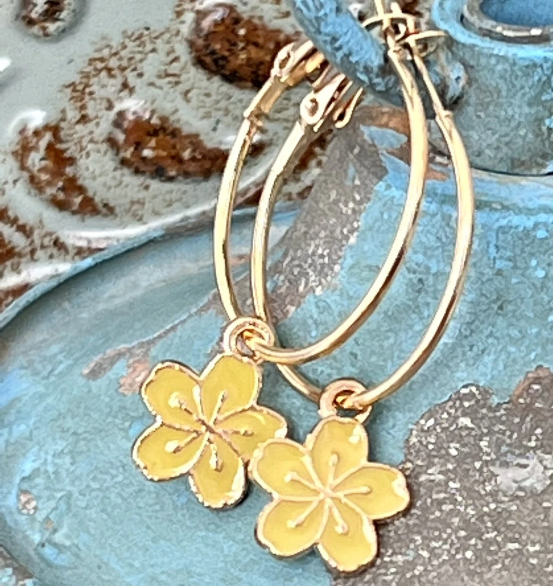 Gold hoop on sale flower earrings
