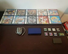 Blue And Black DS Lite W/ Charger And 18 Games 17 DS And 1 GBA