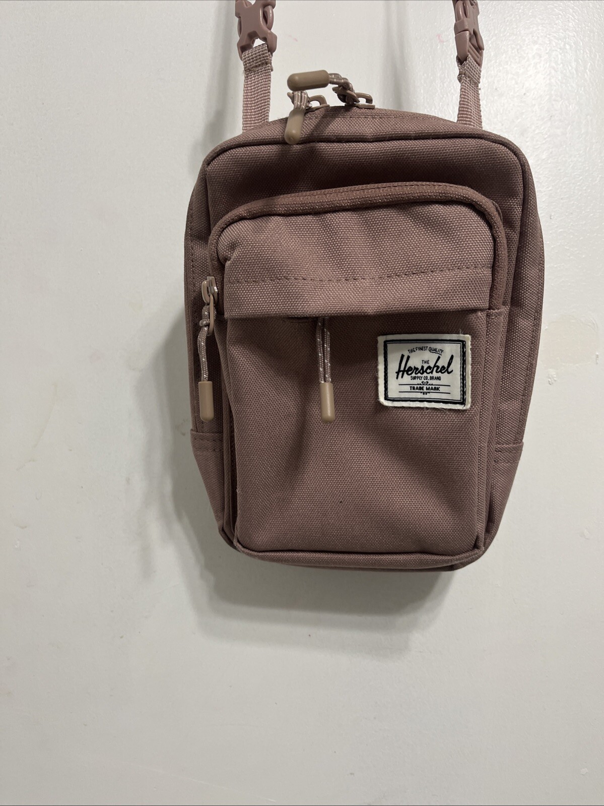 Herschel Supply Co Pink pastel crossbody bag.