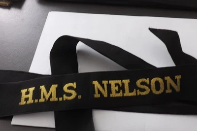 BRITISH ROYAL NAVY CAP TALLY H.M.S. NELSON 100CMS IN LENGTH (3528) - Image 1 of 3