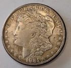 1921 S Morgan Silver Dollar,  AU, Nice Sharp Detail with Gold toning on obverse
