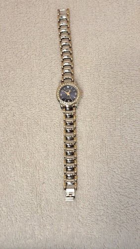 Vintage Womens analog Adrienne Watch Club A Blue background Silver And Gold Band - Picture 4 of 8