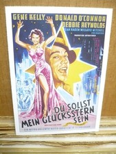 SINGIN' IN THE RAIN, film card (Gene Kelly, Debbie Reynolds, Donald O'Connor)