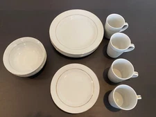 White ceramic gold-banded 16 piece ( 4 place settings) dish set