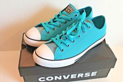 teal colored converse shoes