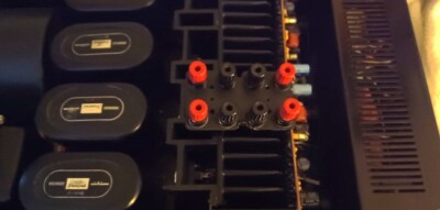 Sansui au-919 speaker terminals for hole openings.