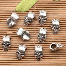Cuentas espaciadoras cara cabeza calavera tono plata tibetano agujero 3 mm 11x6 mm 20 un. H0423