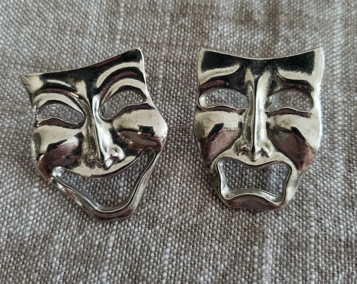 Metal face hotsell earrings