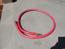 2/0 AWG Ancor Marine Grade battery cable approximately 50" long red.