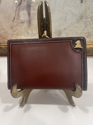 Mark Cross brown leather wallet with gold-toned chess piece emblem
