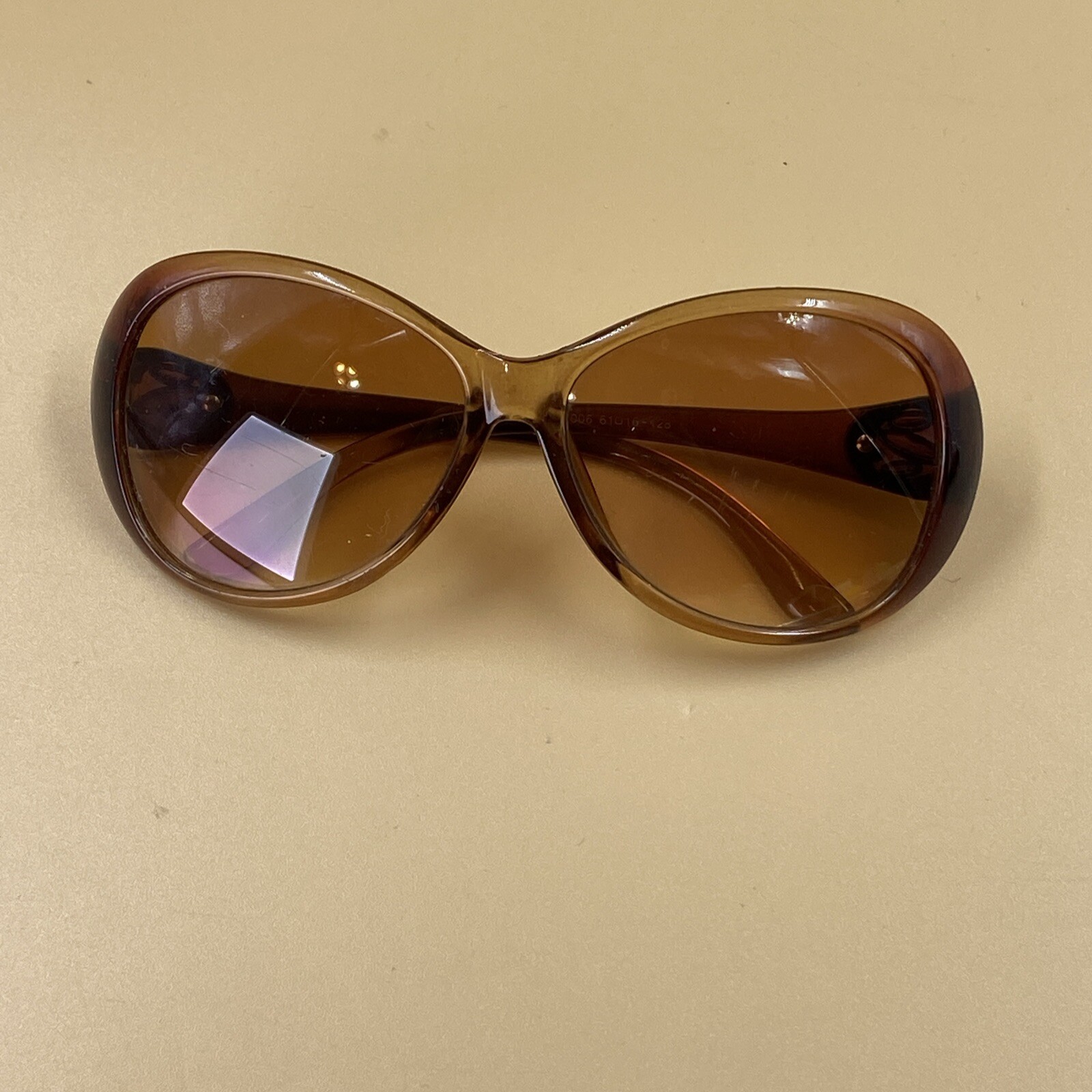 Aria Woman’s Sunglasses  Translucent Frames Brown… - image 1