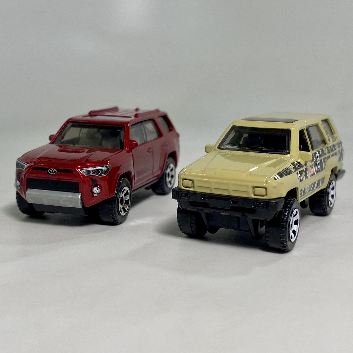 Matchbox '18 Toyota 4Runner Red 1:64 & 1985 Toyota 4Runner Tan 1