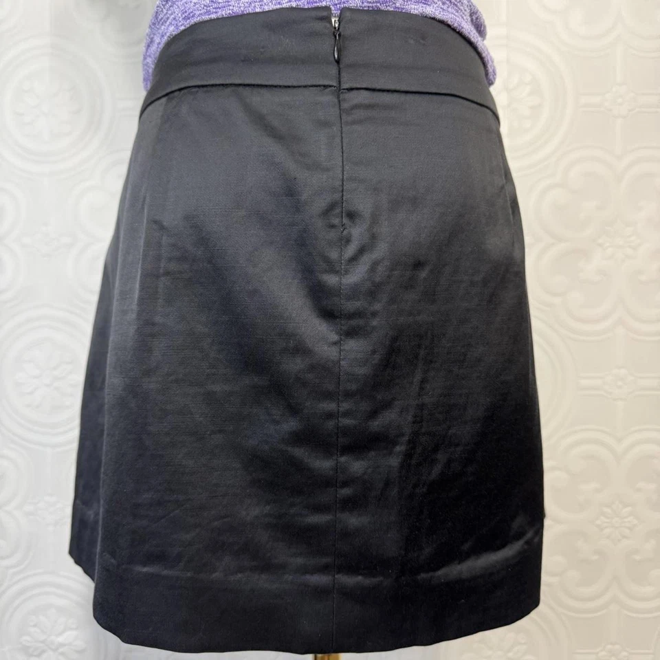 Minifalda vintage Bebe para mujer 8 bolsillos plisados satinados negros sirena de oficina Y2K Foto 3 de 4