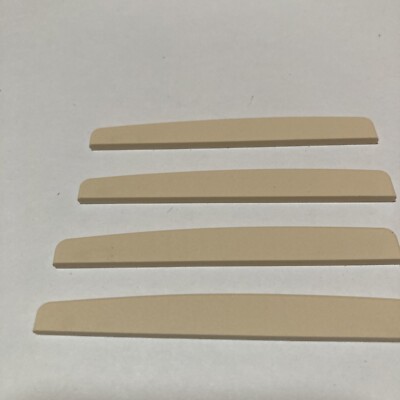 one  Genuine new CF Martin 12 Inch Radius Micarta Shaped Acoustic Guitar Saddle