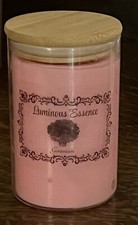 Tarro redondo de vela perfumada de geranio Luminous Essence 8 oz 13,99