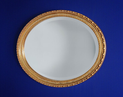 Vintage ovaler abgeschrägter Wandspiegel zum Aufhängen mit Distressed Gold vergoldet
