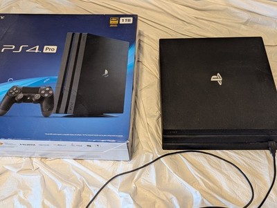 Sony PlayStation 4 Pro 1TB Console - 15 games and 4 controllers