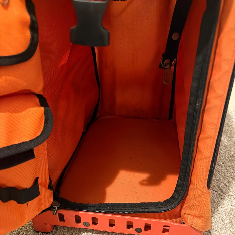 Marco de bolsa de coche deportivo Zuca naranja a rayas de tigre Foto 2 de 4