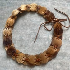 1970s hair on hide leather circle tie up belt