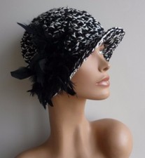 winter hat knitted vintage millinery style with black feather adornment
