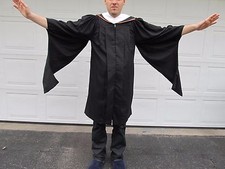 doctoral graduation gown and hood, maroon, peach, white hood