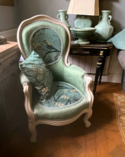 Antique french armchair in lovely muted greens and turquoise with matching cushi
